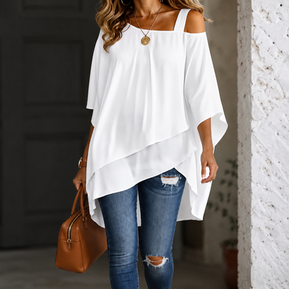 Irena – Blouse met asymmetrische zoom