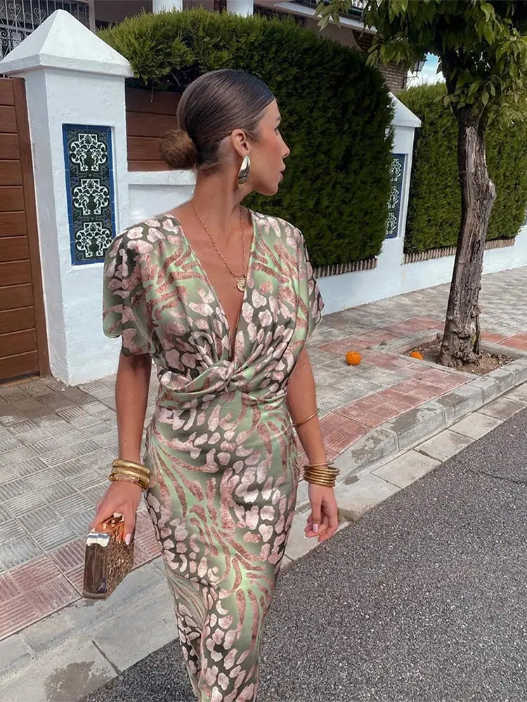 Kornelia – Elegancka sukienka midi z wiązaniem w talii